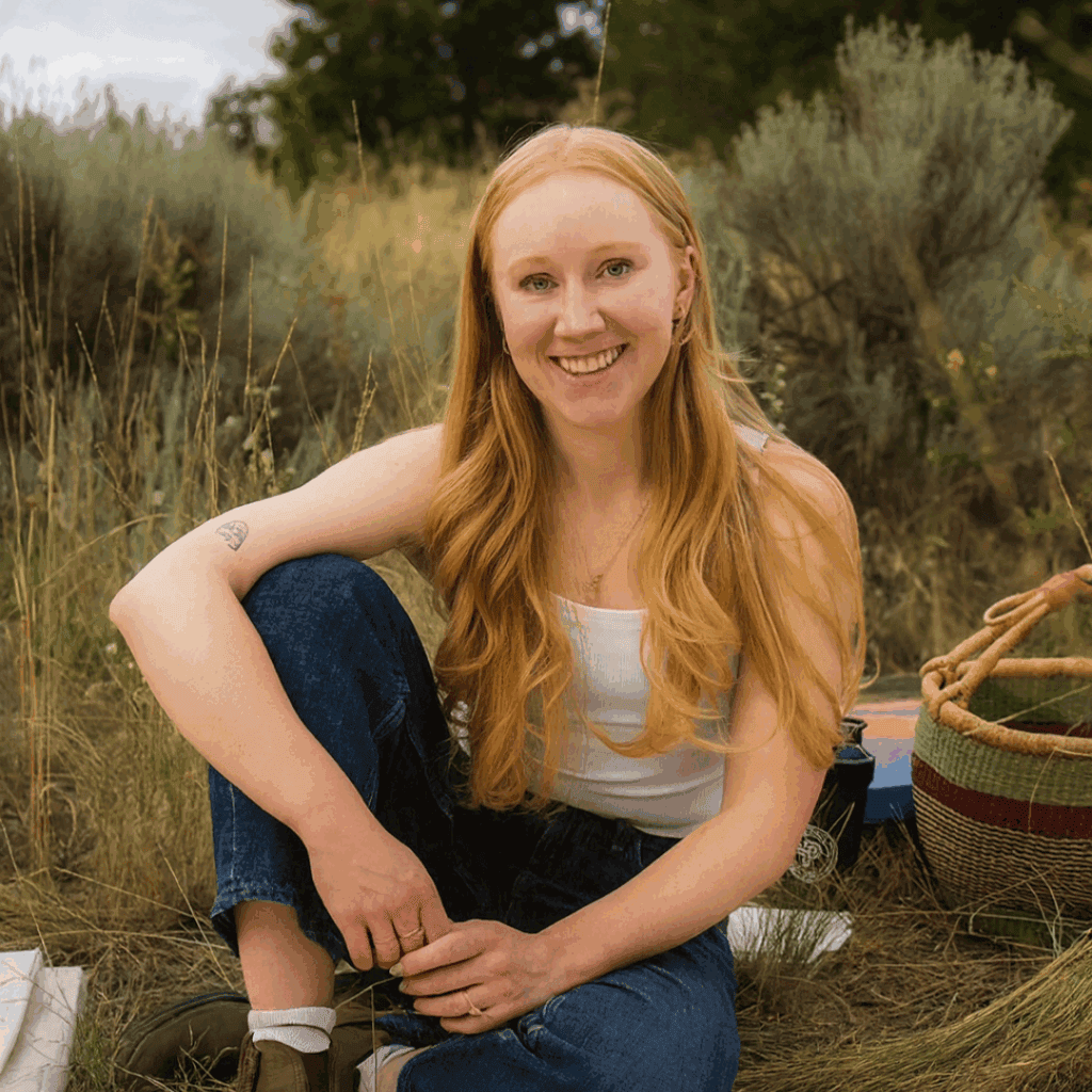 Headshot of counsellor Josephine Ruos smiling outdoors in a natural setting