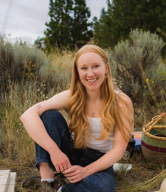 Headshot of counsellor Josephine Ruos smiling outdoors in a natural setting