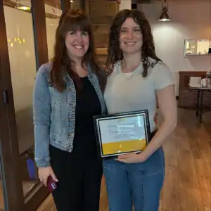Bianca McGann receiving her R.I.C. Graduate Internship certificate during the supervision celebration.