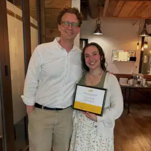 Karis Hand receiving her Graduate Student Internship award during the R.I.C. supervision celebration.